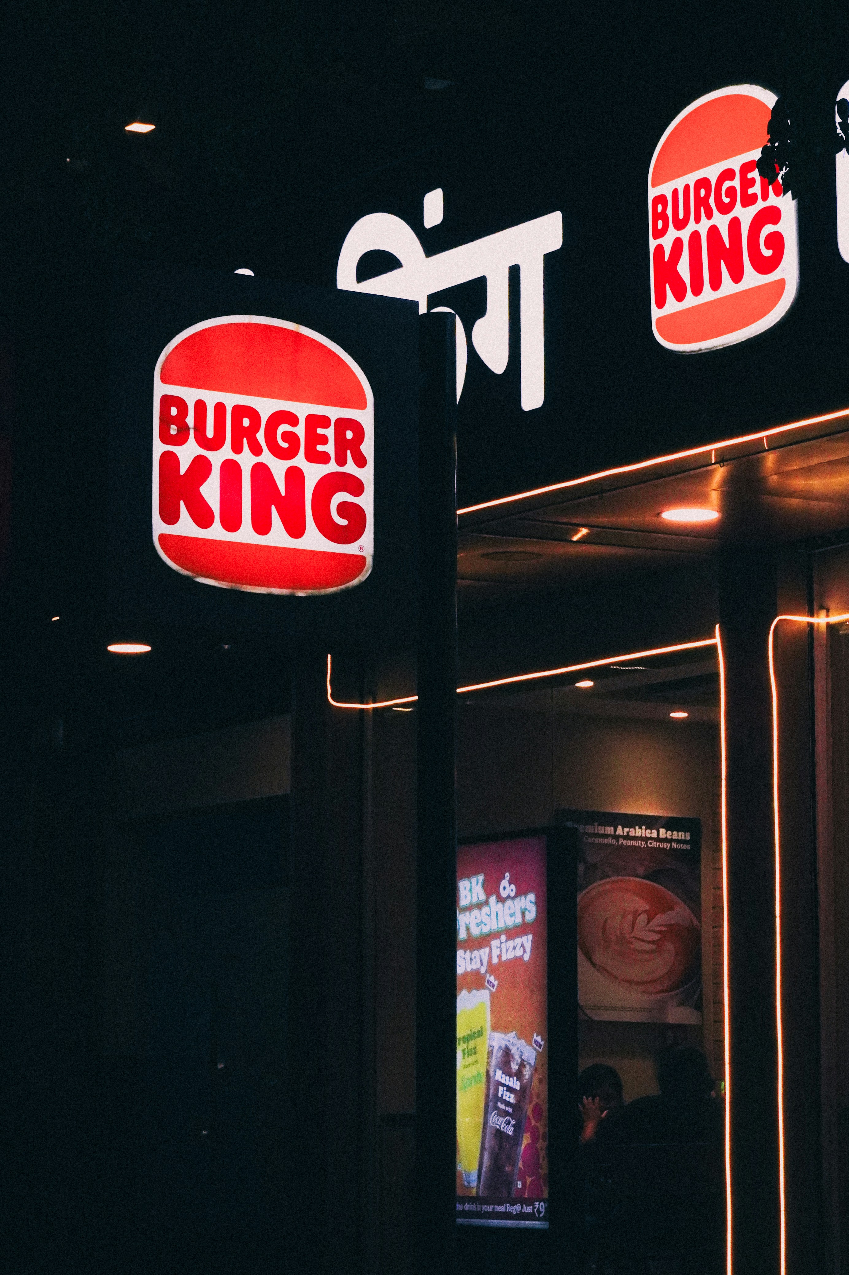 Burger King signs on dark storefront - Free Photo on Unsplash