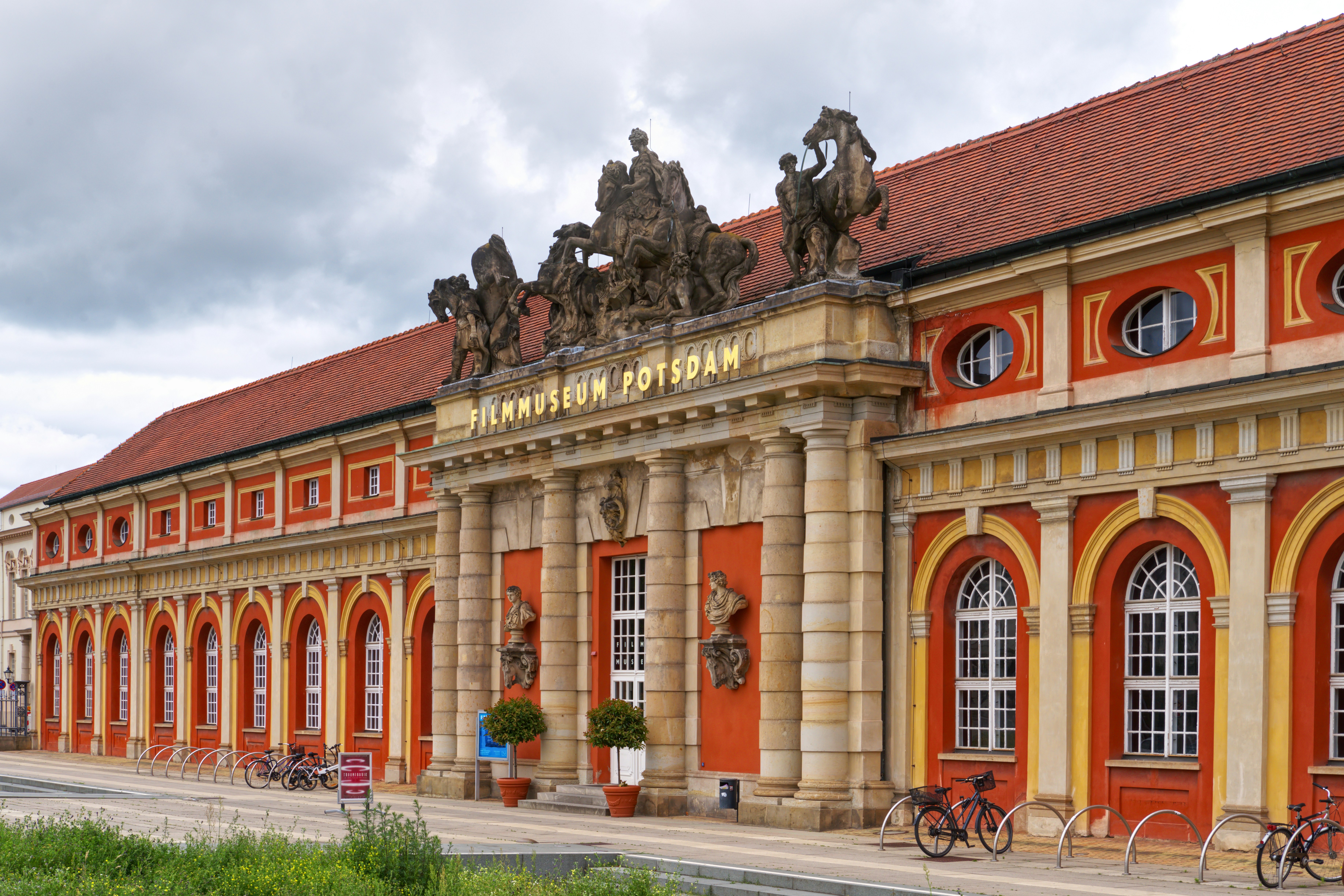 Filmmuseum Potsdam building with stone columns - Free Photo on Unsplash