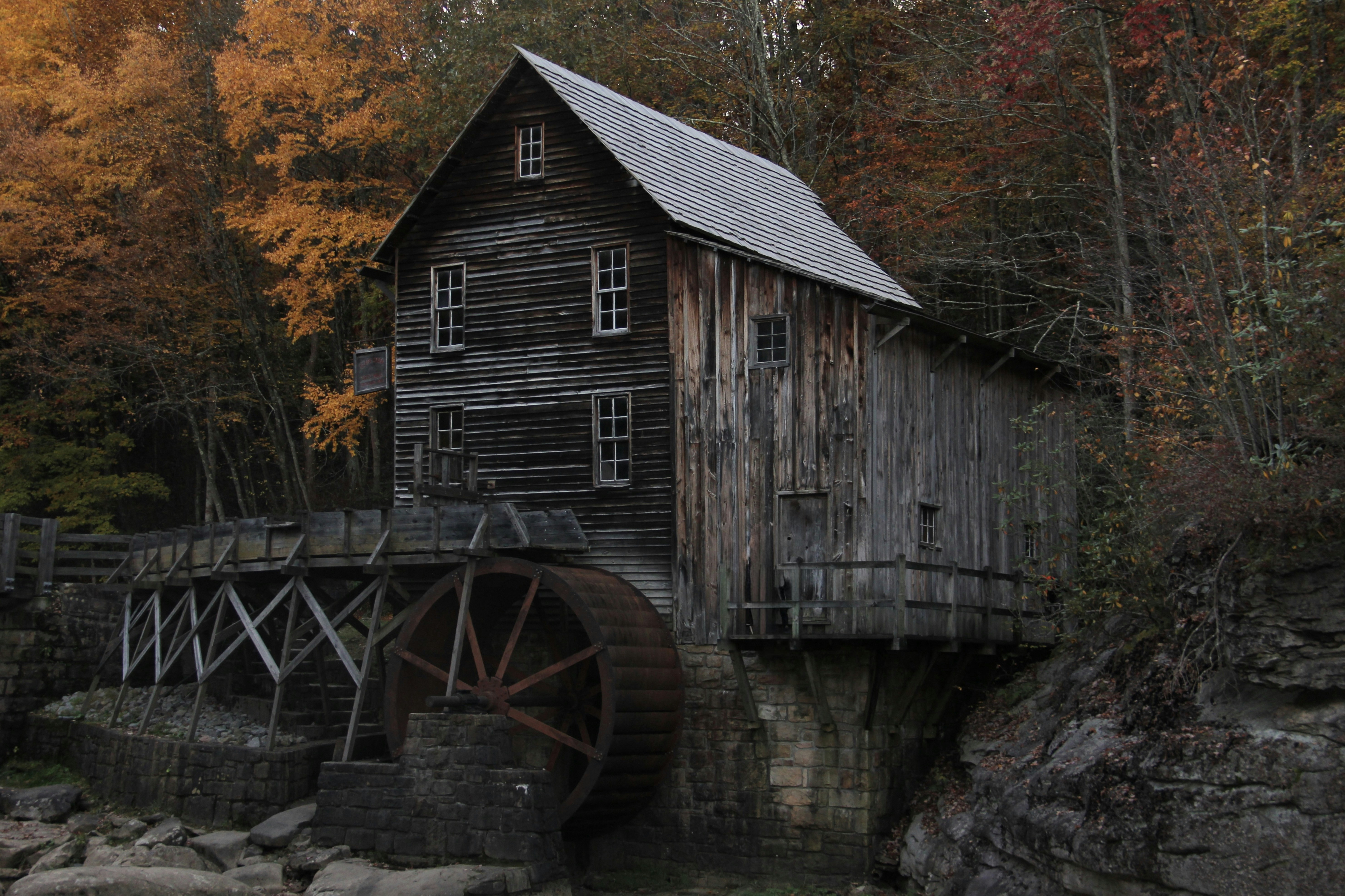 Wooden grist mill in autumn forest - Free Photo on Unsplash