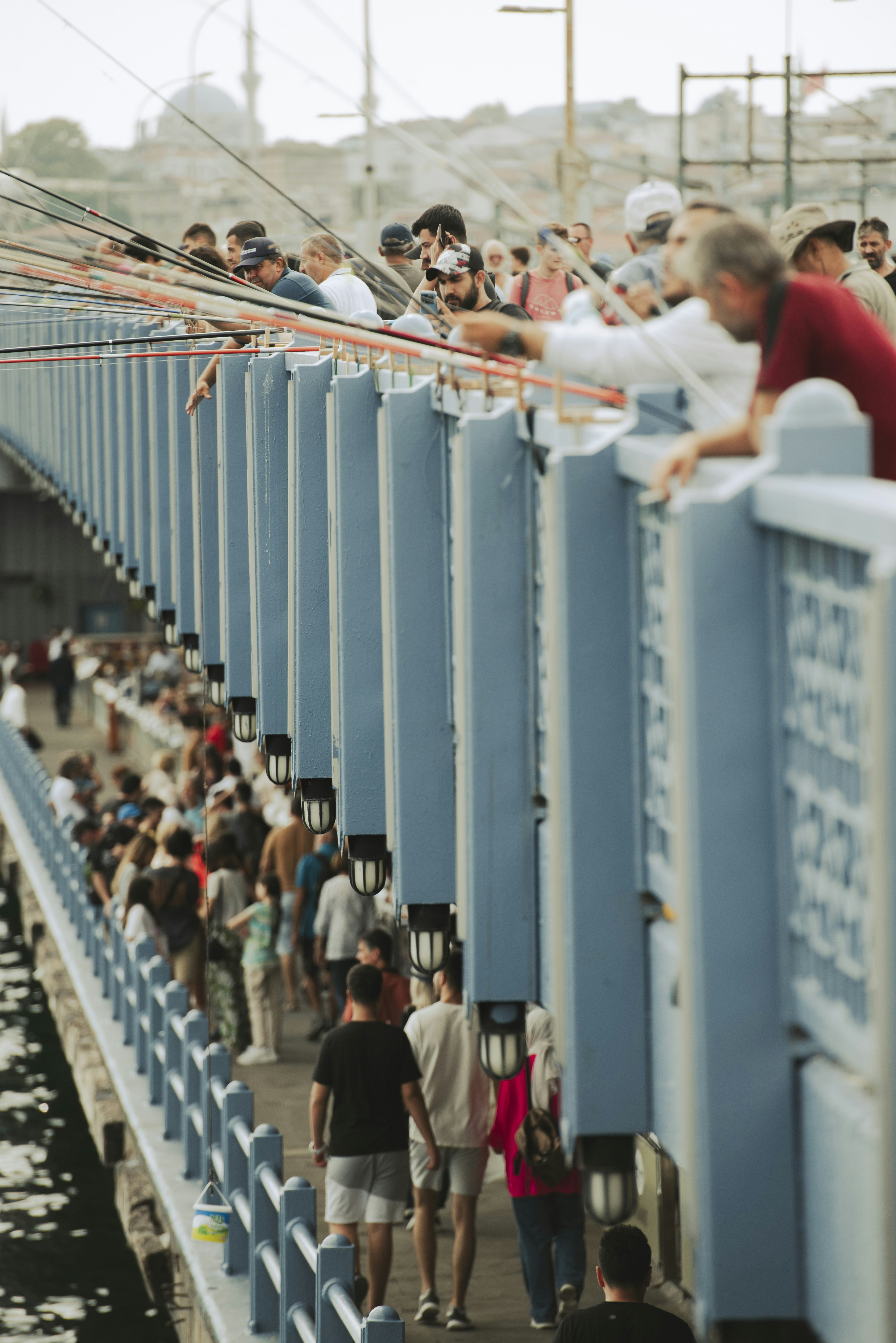 People fishing on Galata Bridge - Free Photo on Unsplash