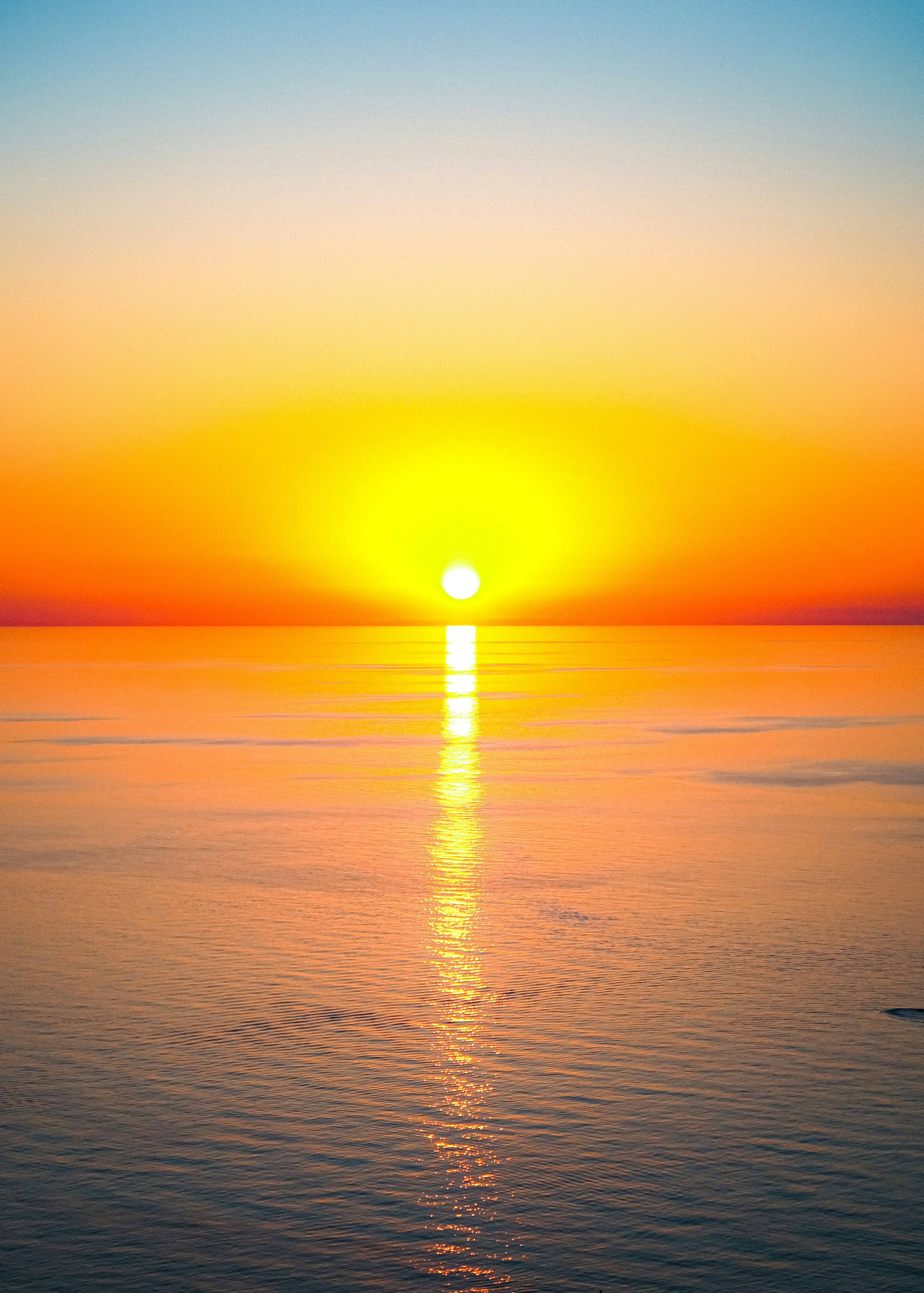 Low sun over calm sea - Free Photo on Unsplash