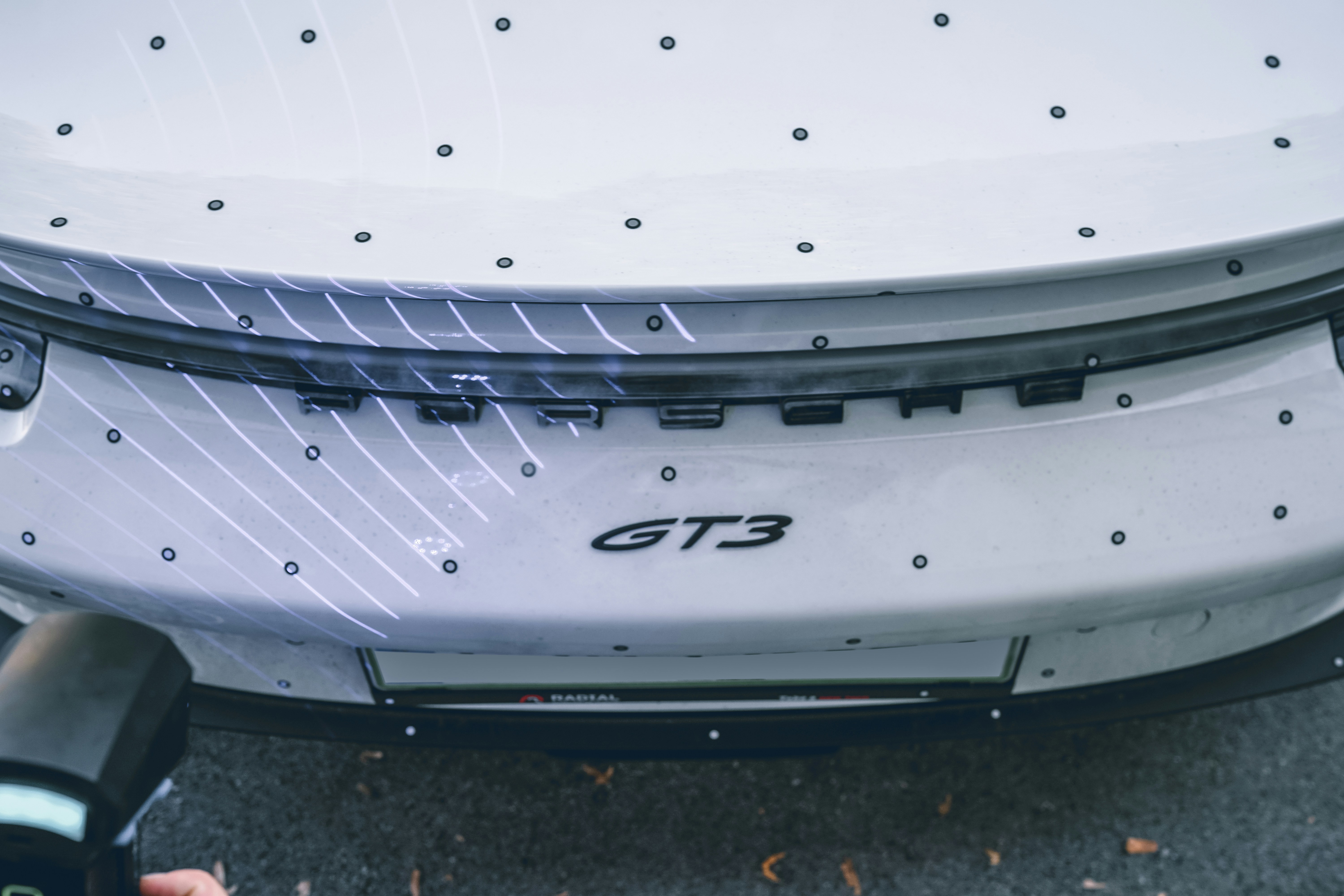 White Porsche GT3 with tracking markers - Free Photo on Unsplash