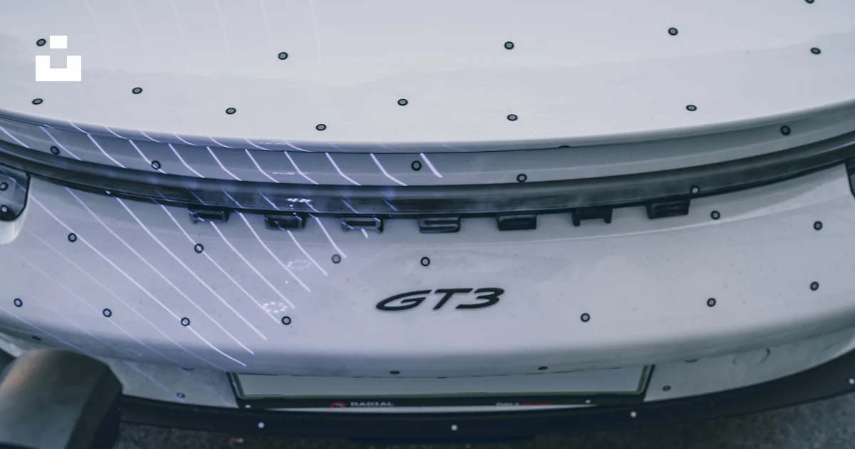 Tracking Alignment White Porsche GT3 with tracking markers - Free Photo on Unsplash