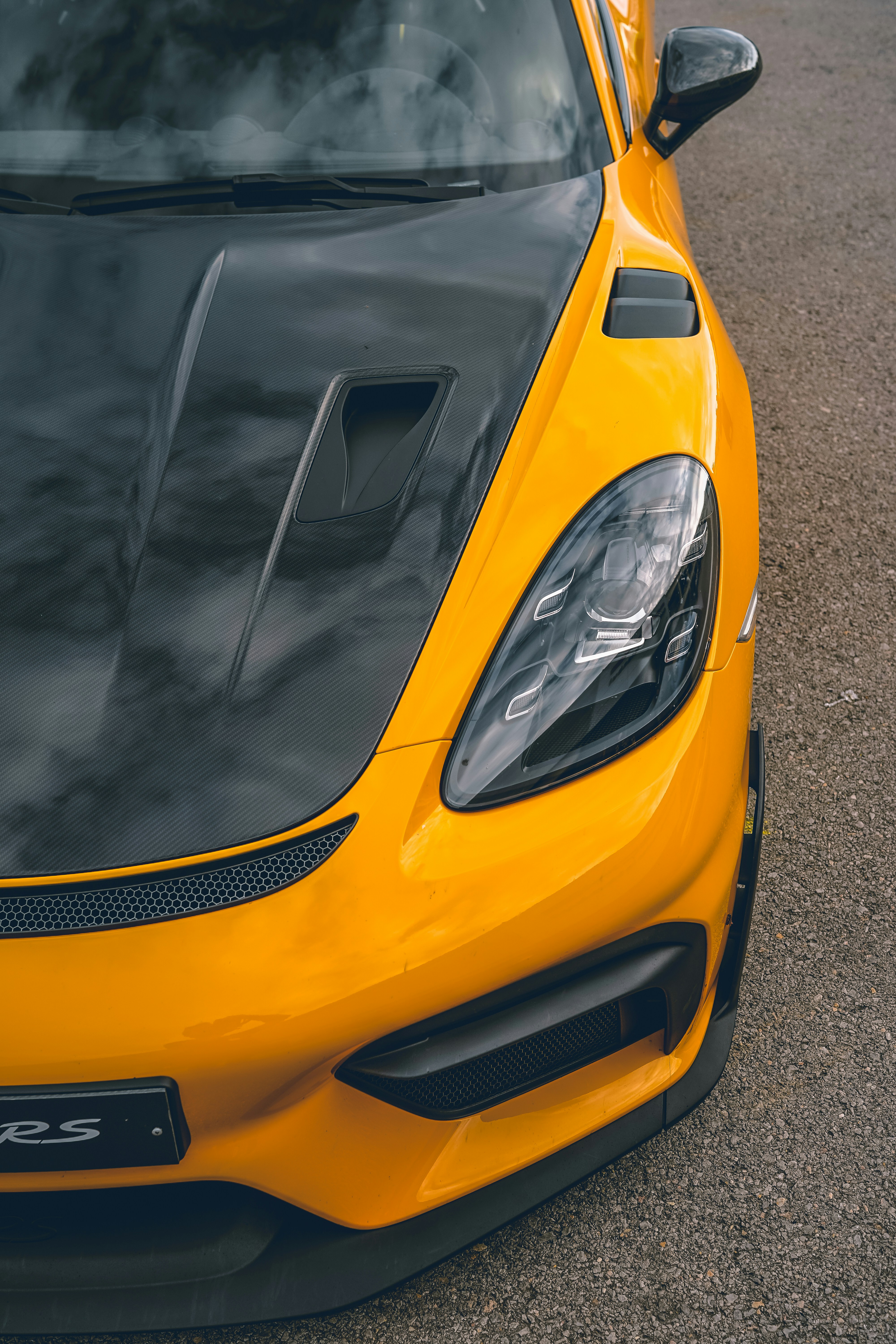 Yellow sports car with carbon hood - Free Photo on Unsplash