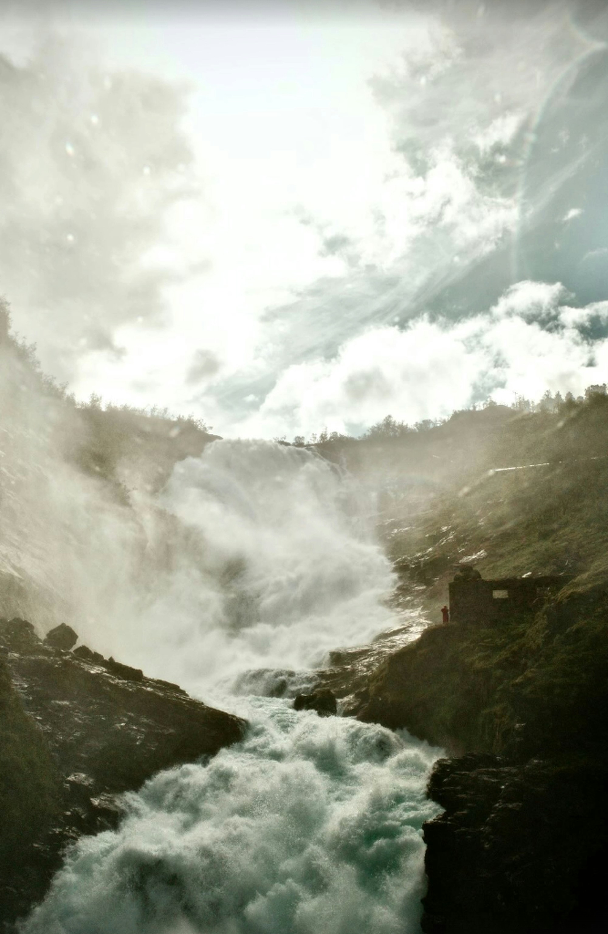 Powerful waterfall on rocky mountain slope - Free Photo on Unsplash
