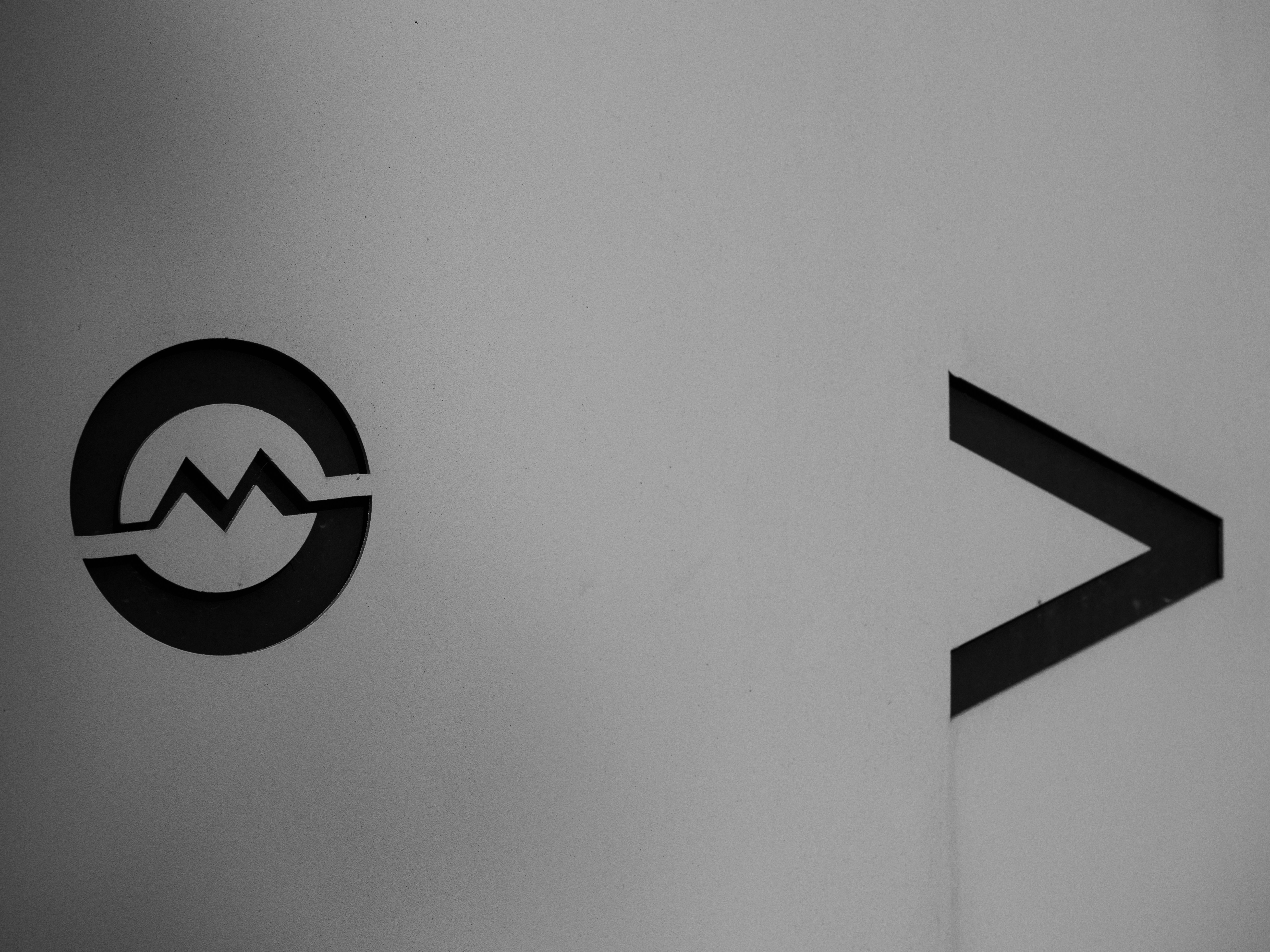 Black mountain logo and chevron - Free Photo on Unsplash