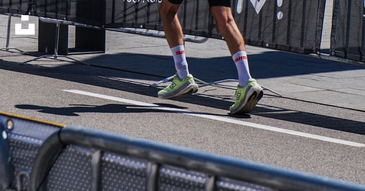 License Stree Racing Triathlete running on sunny city street - Free Photo on Unsplash