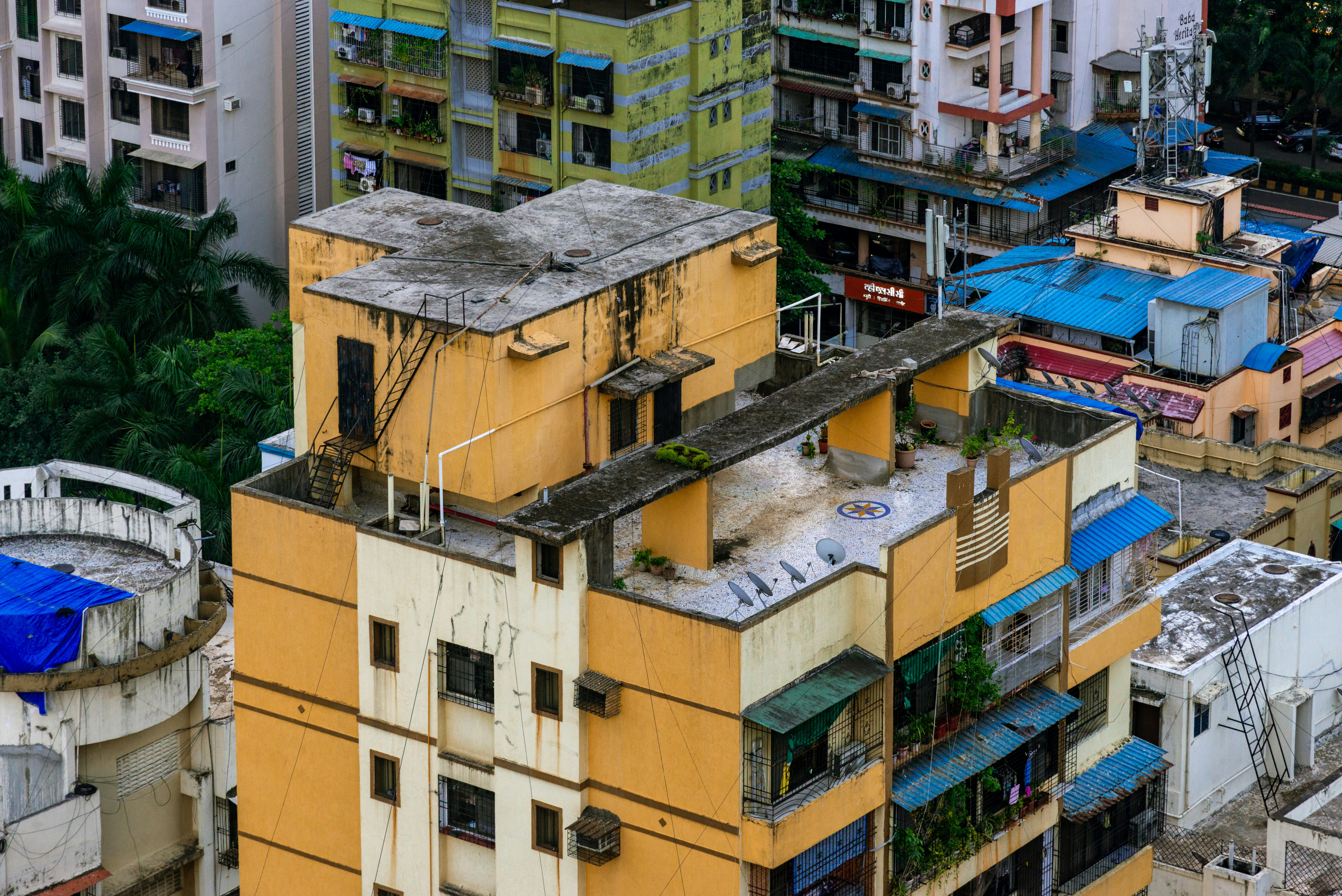 Yellow apartment building in Navi Mumbai - Free Photo on Unsplash