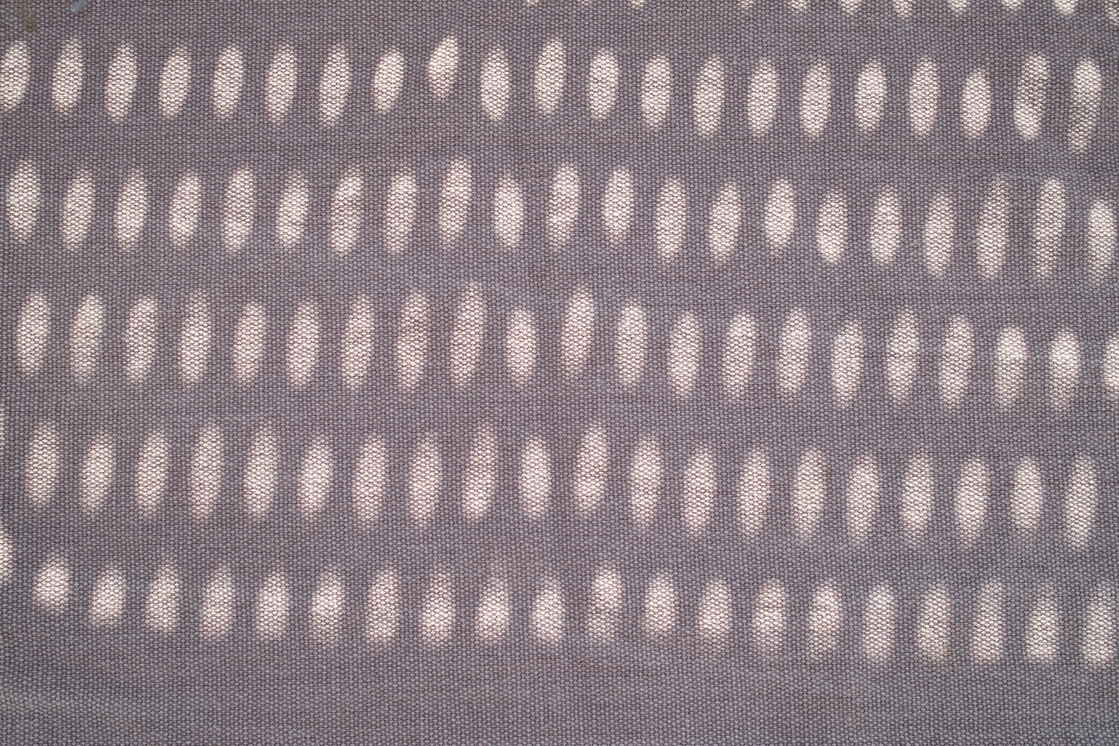 Oval light patterns on grey fabric - Free Photo on Unsplash
