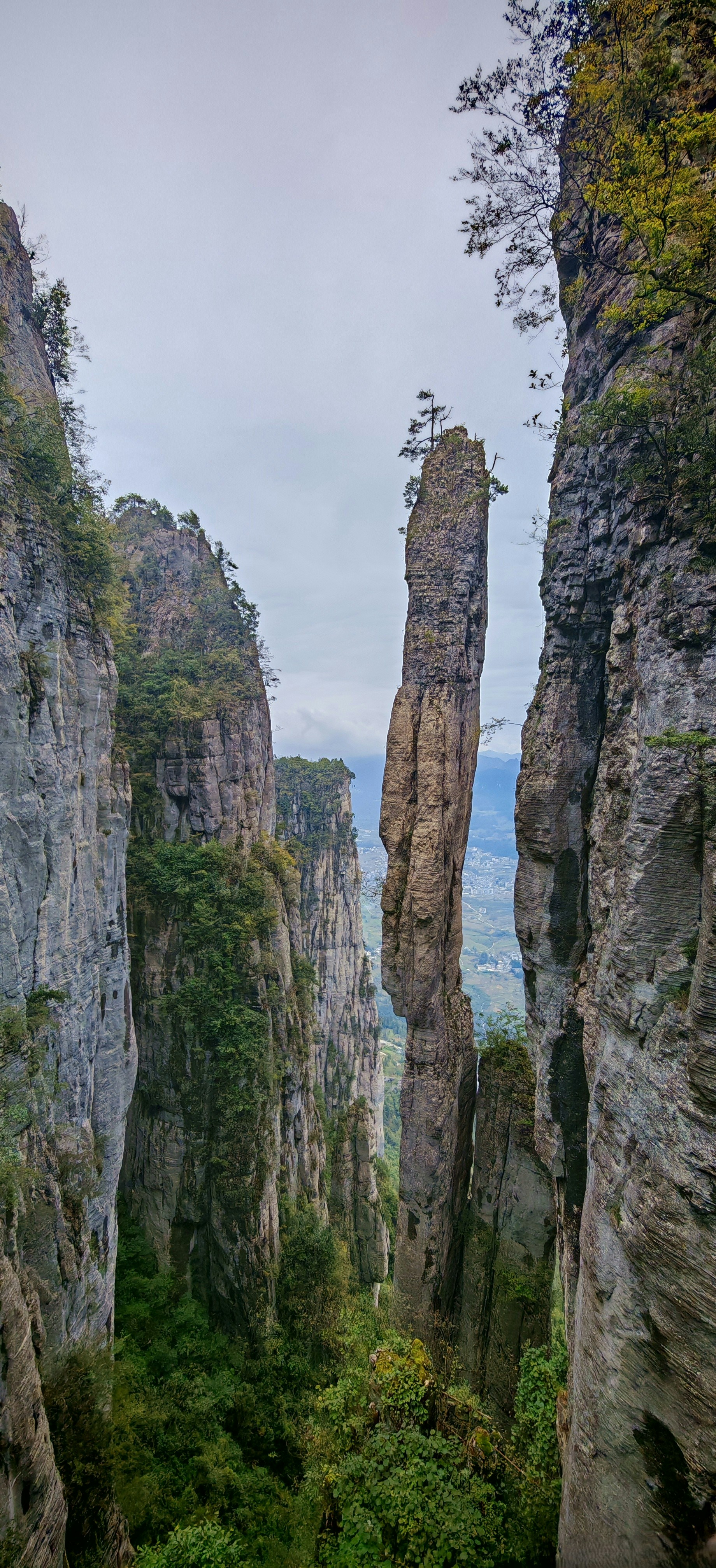 A rock pillar with 150 meters high is nicknamed One Pillar of Incense or Yizhuxiang Column in Qixingzhai in Enshi Grand Canyon, Hubei, China.