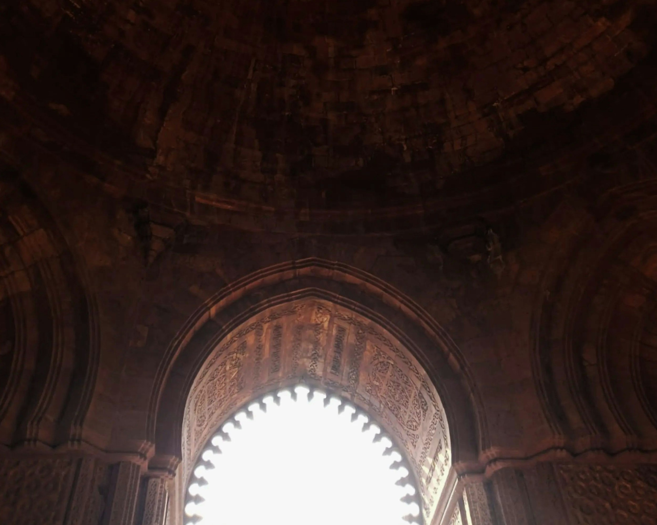 Ornate stone archway with intricate carvings - Free Photo on Unsplash
