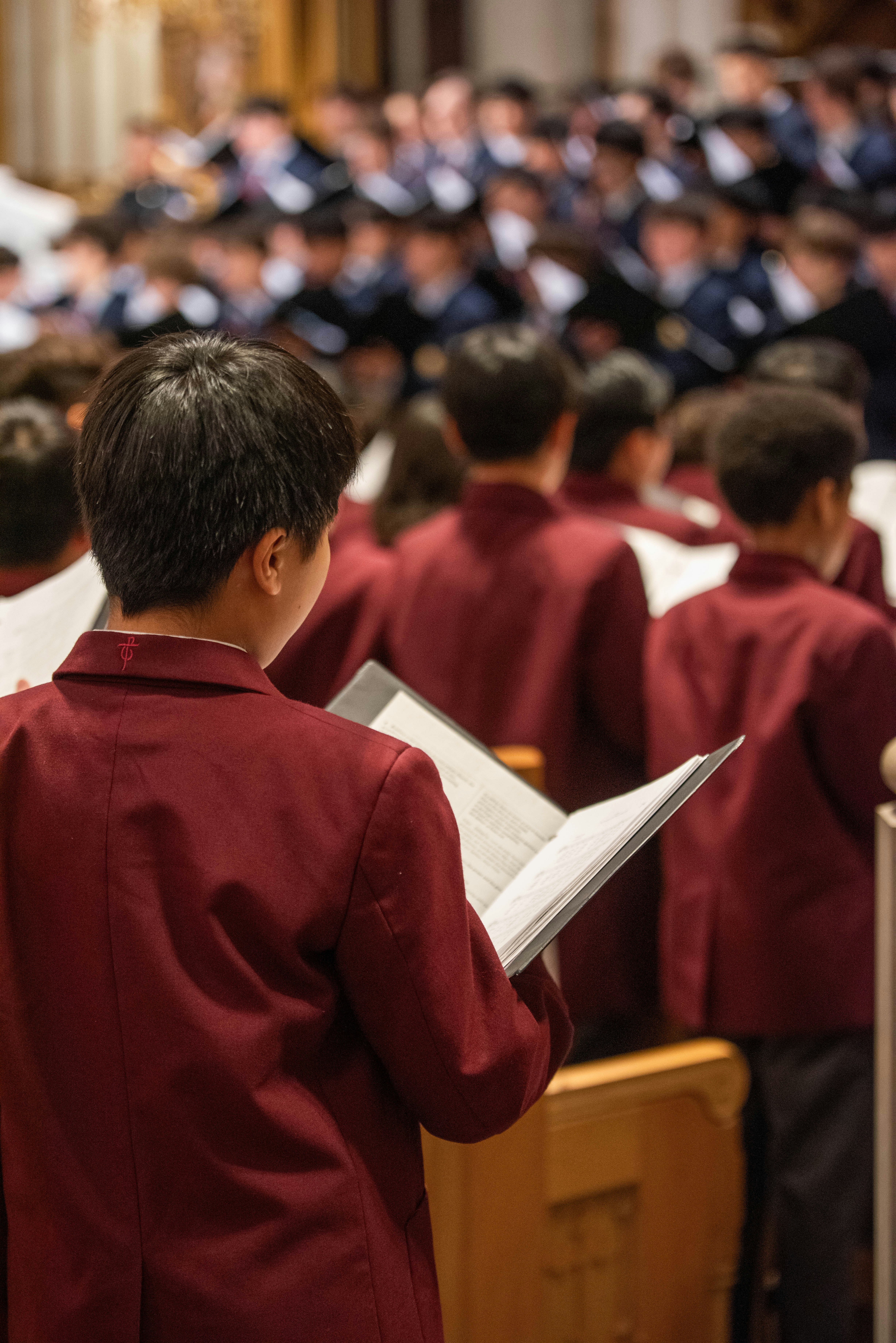 Boy in maroon blazer singing - Free Photo on Unsplash