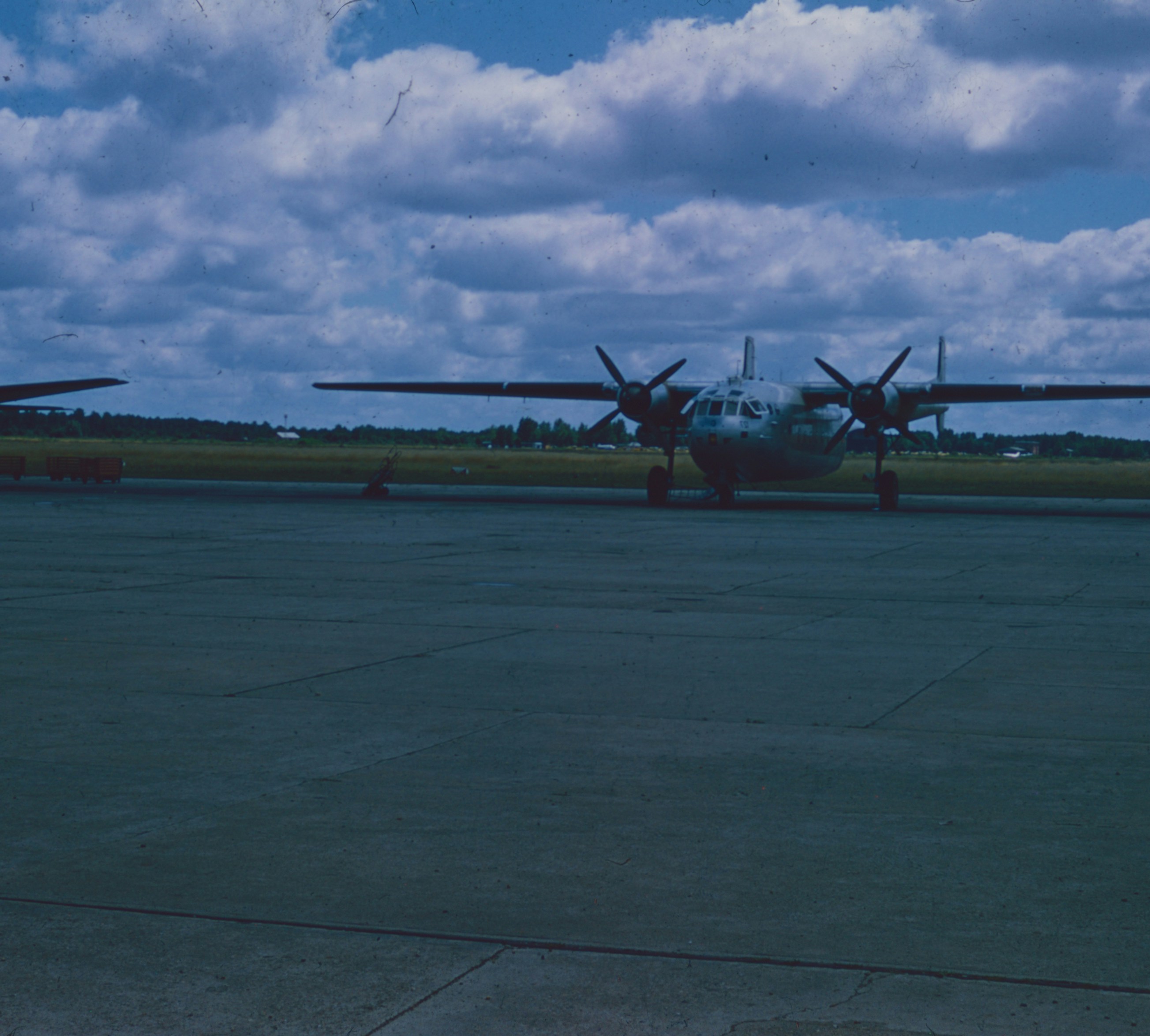 Twin-engine propeller aircraft on airfield - Free Photo on Unsplash