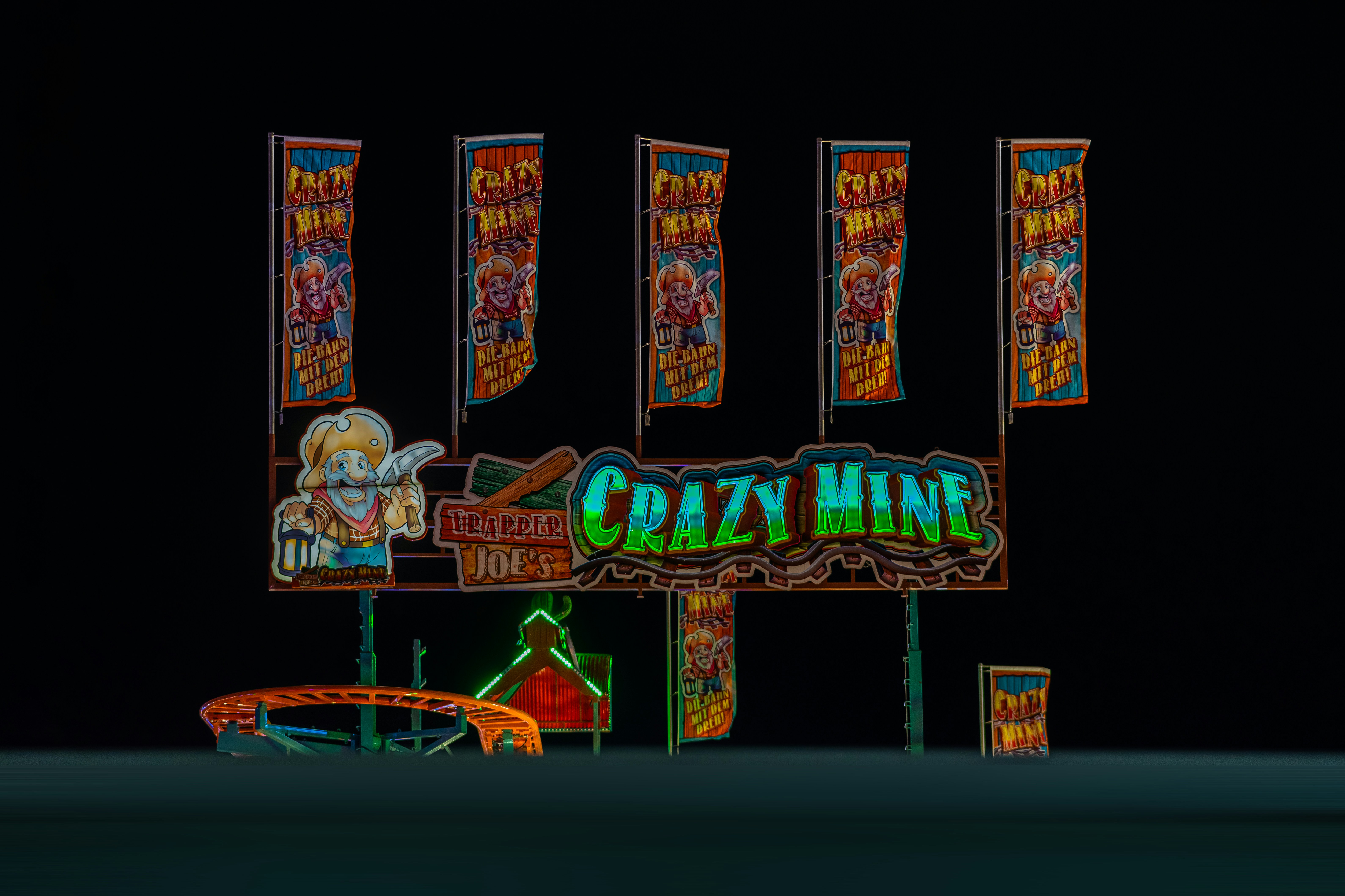 Crazy Mine roller coaster ride sign - Free Photo on Unsplash