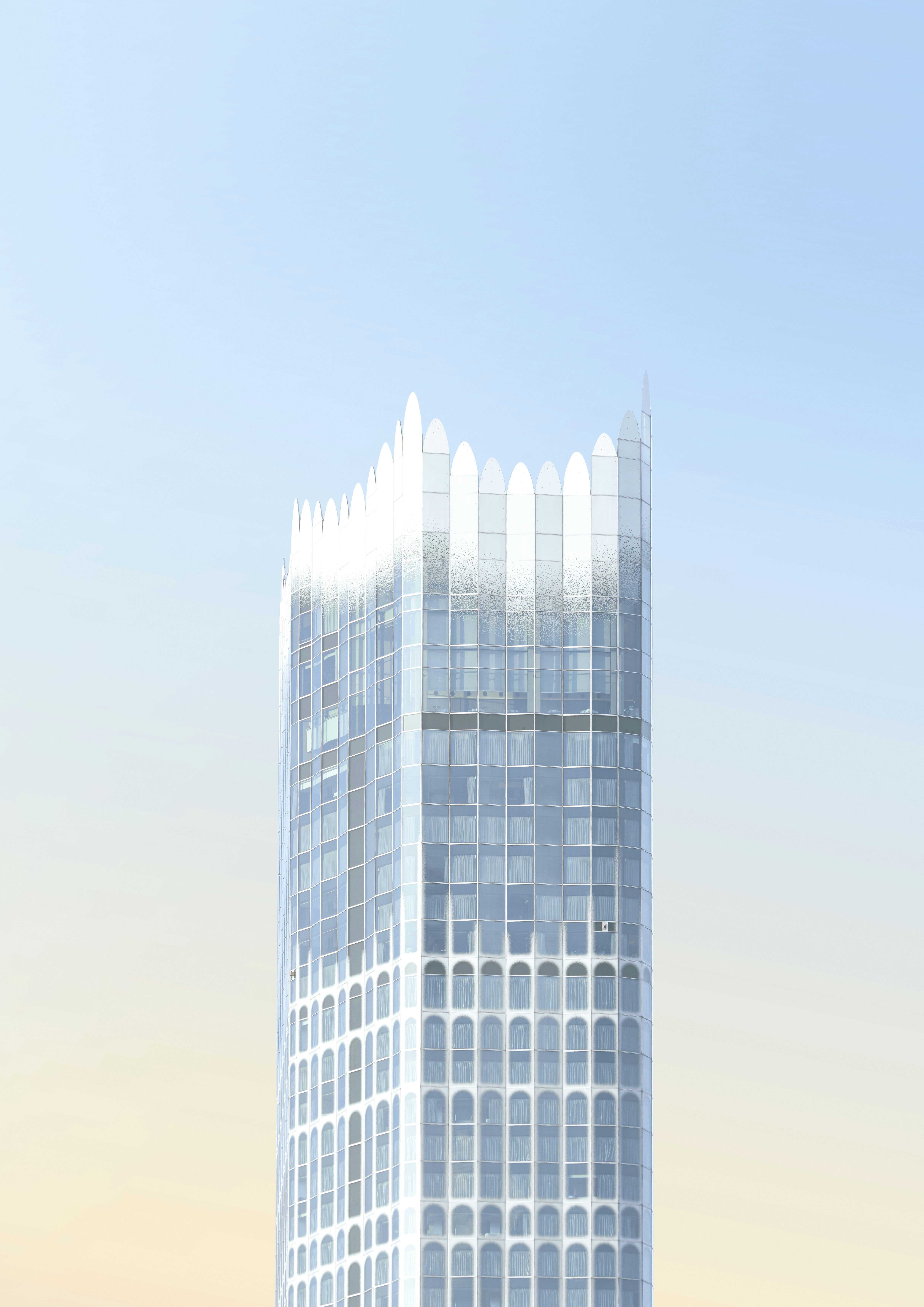 Modern glass skyscraper with scalloped crown - Free Photo on Unsplash