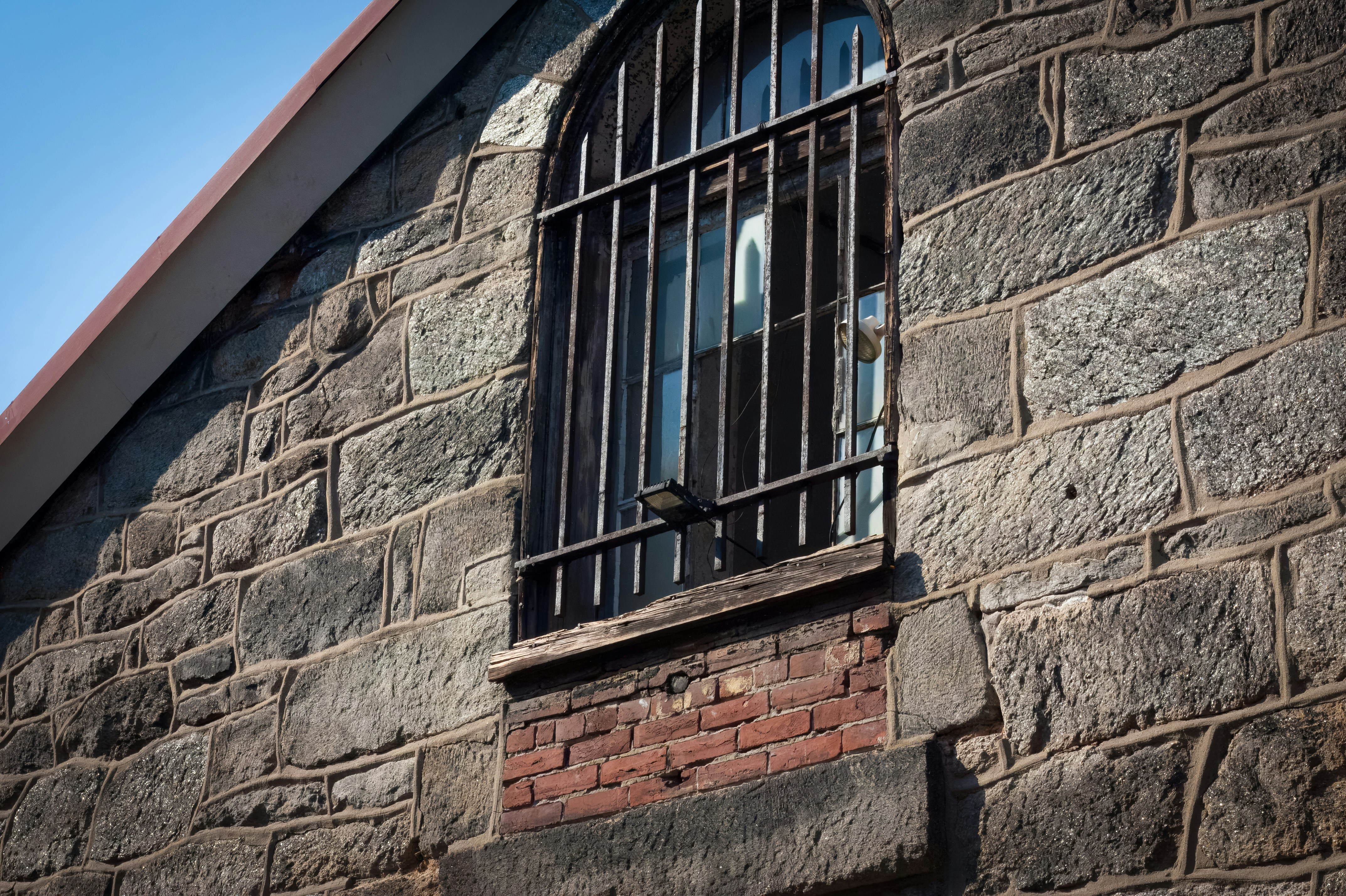 Arched window in stone wall - Free Photo on Unsplash