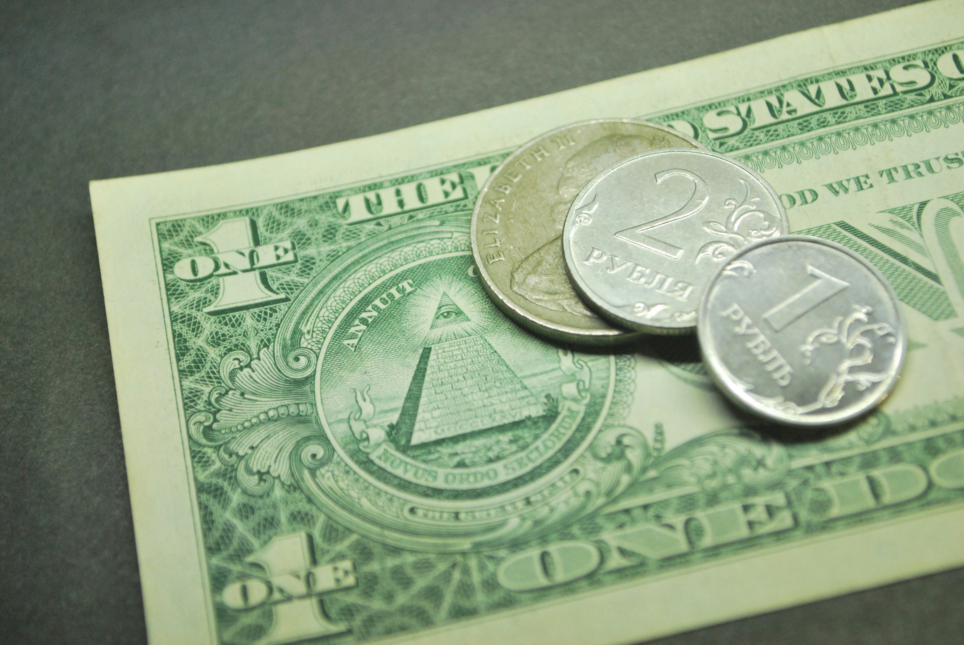 Dollar bill with Russian ruble coins - Free Photo on Unsplash