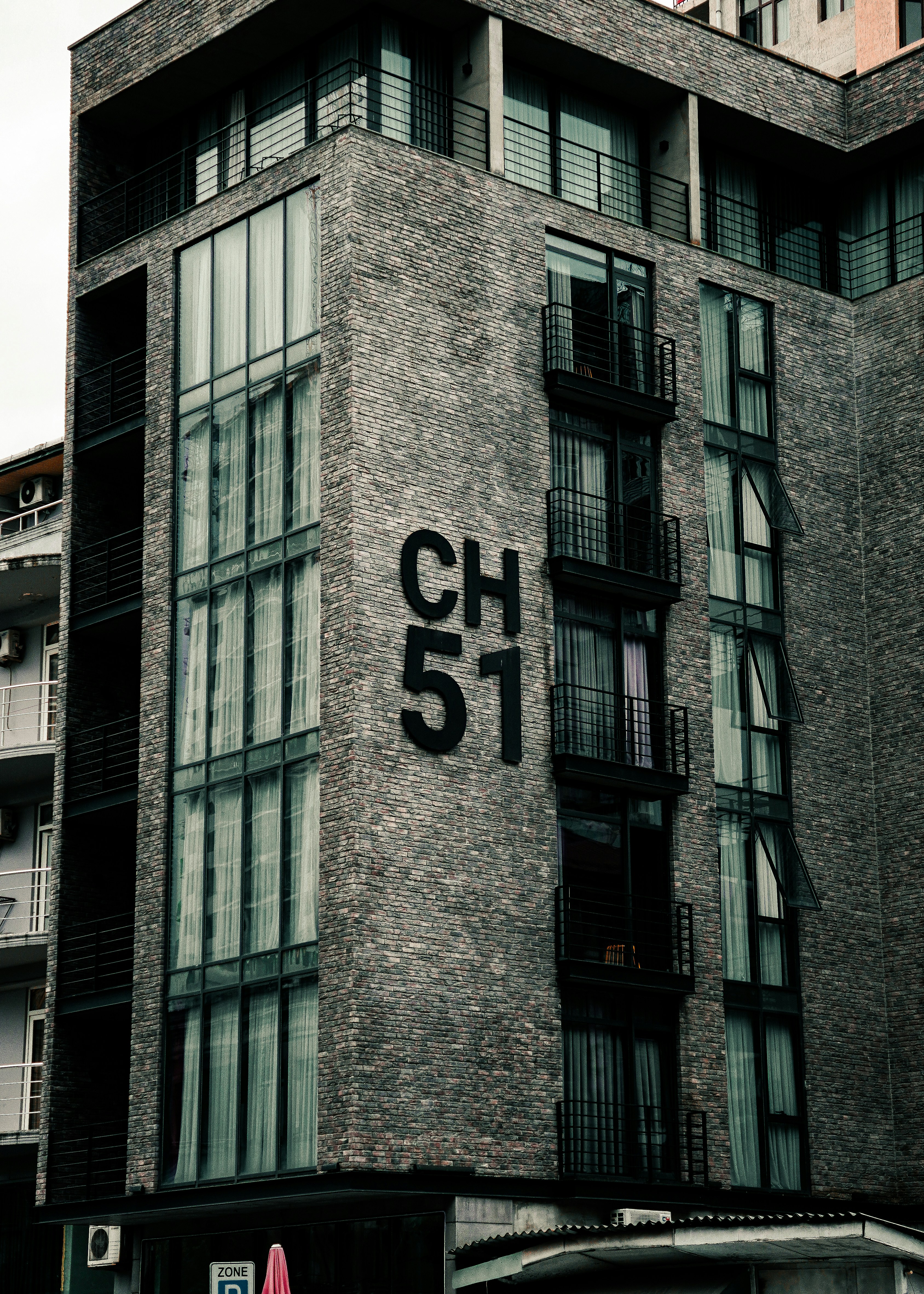 Modern brick building with CH 51 - Free Photo on Unsplash