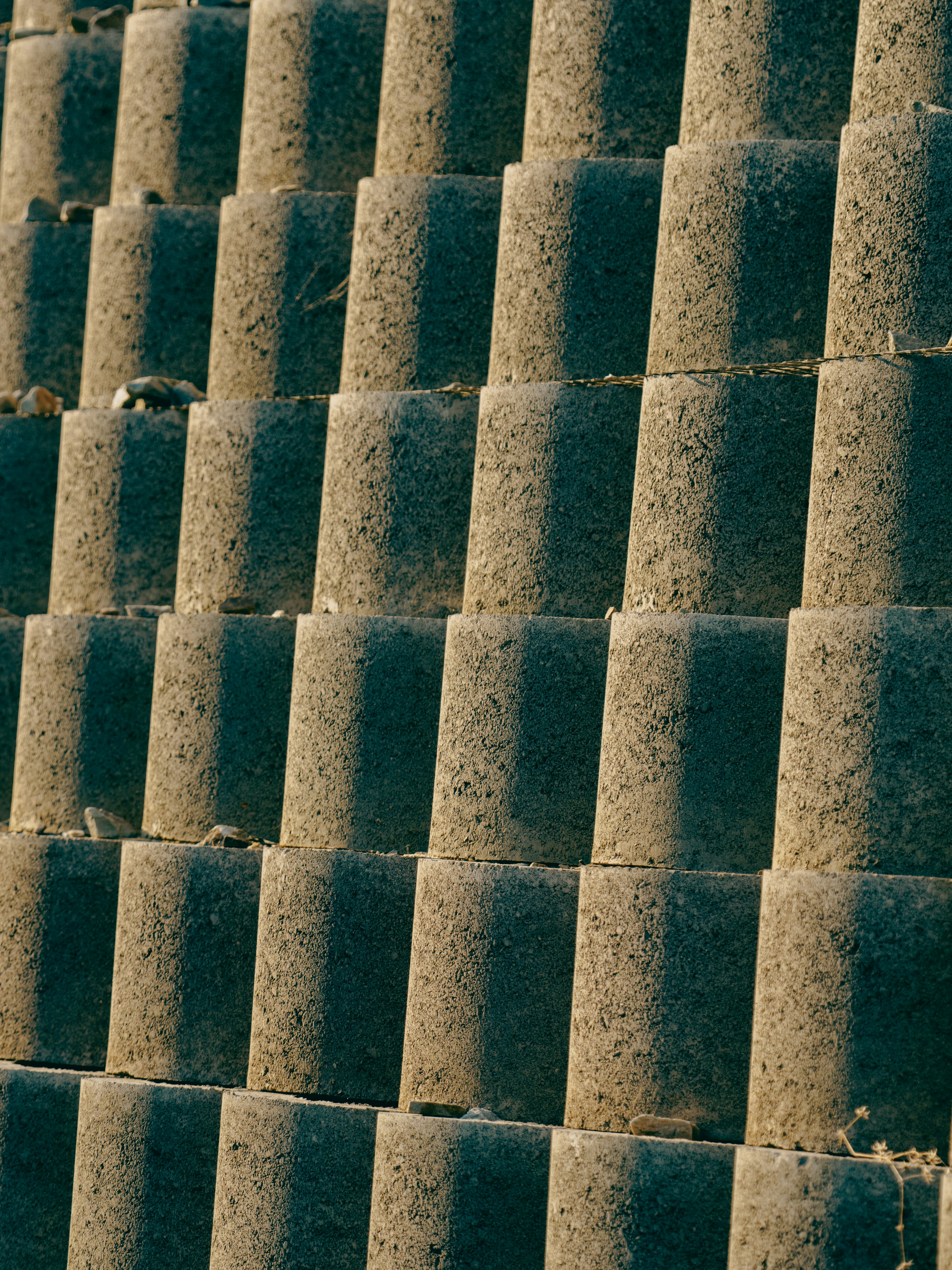 Stacked concrete retaining wall blocks - Free Photo on Unsplash