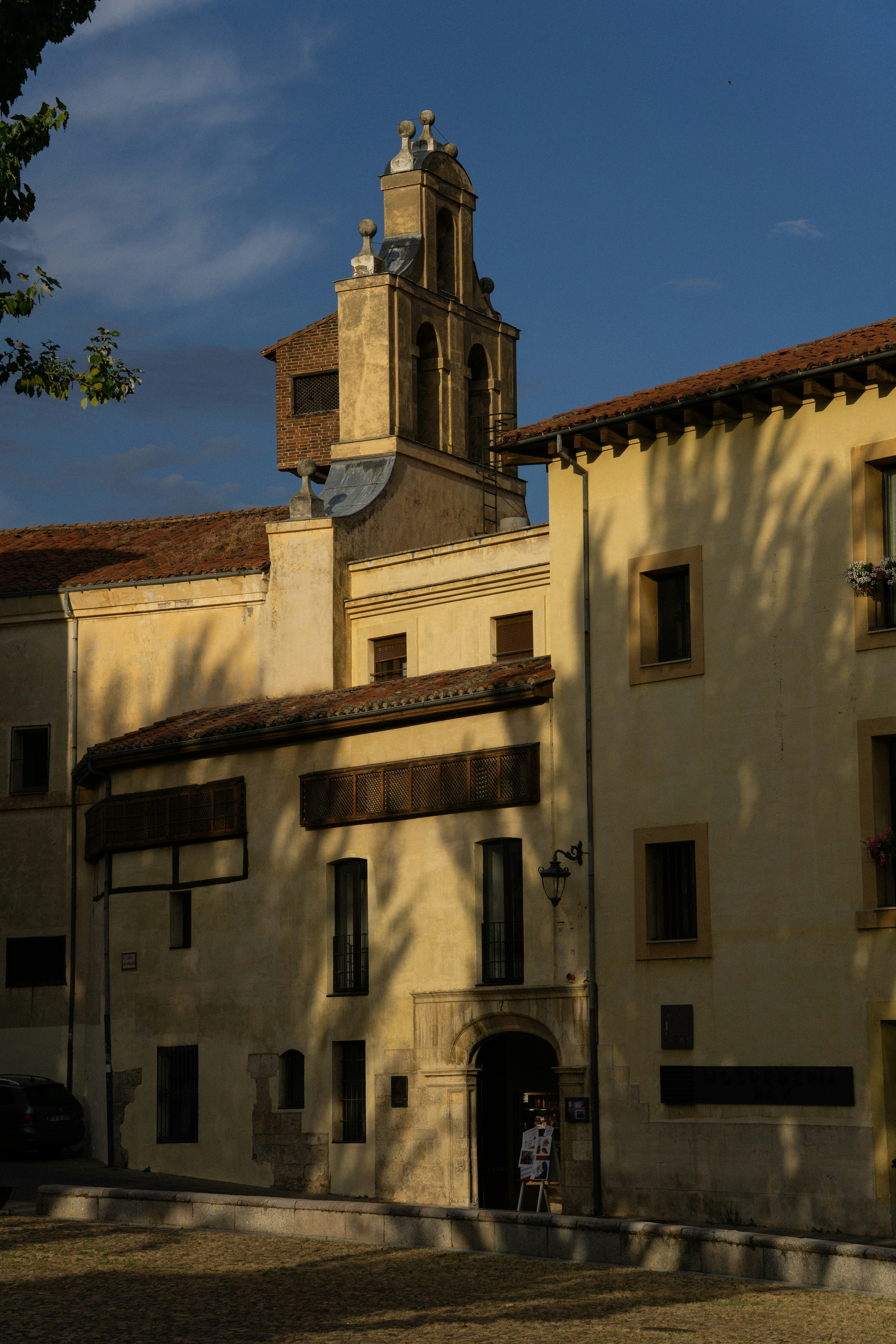 Historic yellow stone building with tower - Free Photo on Unsplash