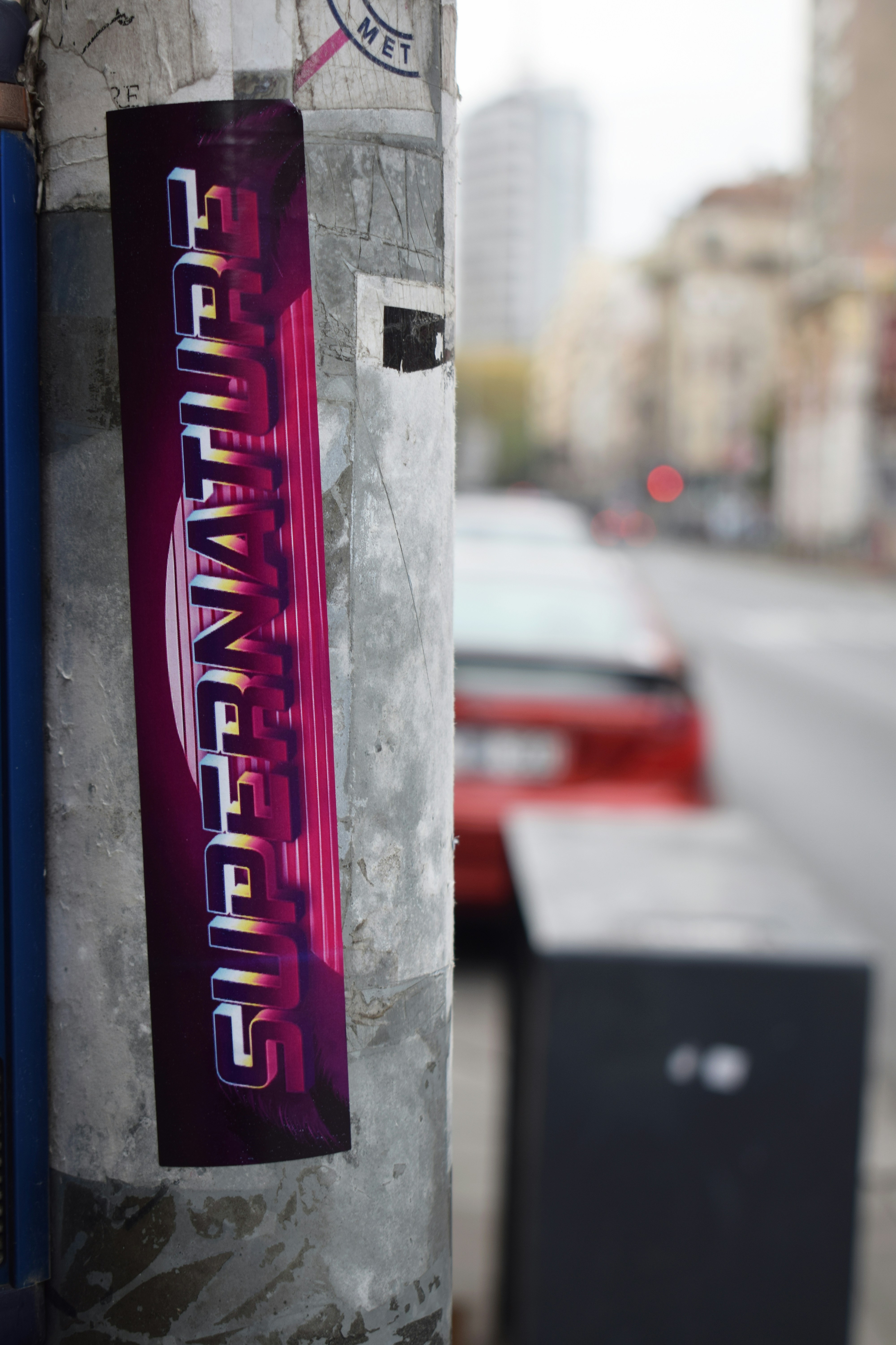 Supernature sticker on utility pole - Free Photo on Unsplash