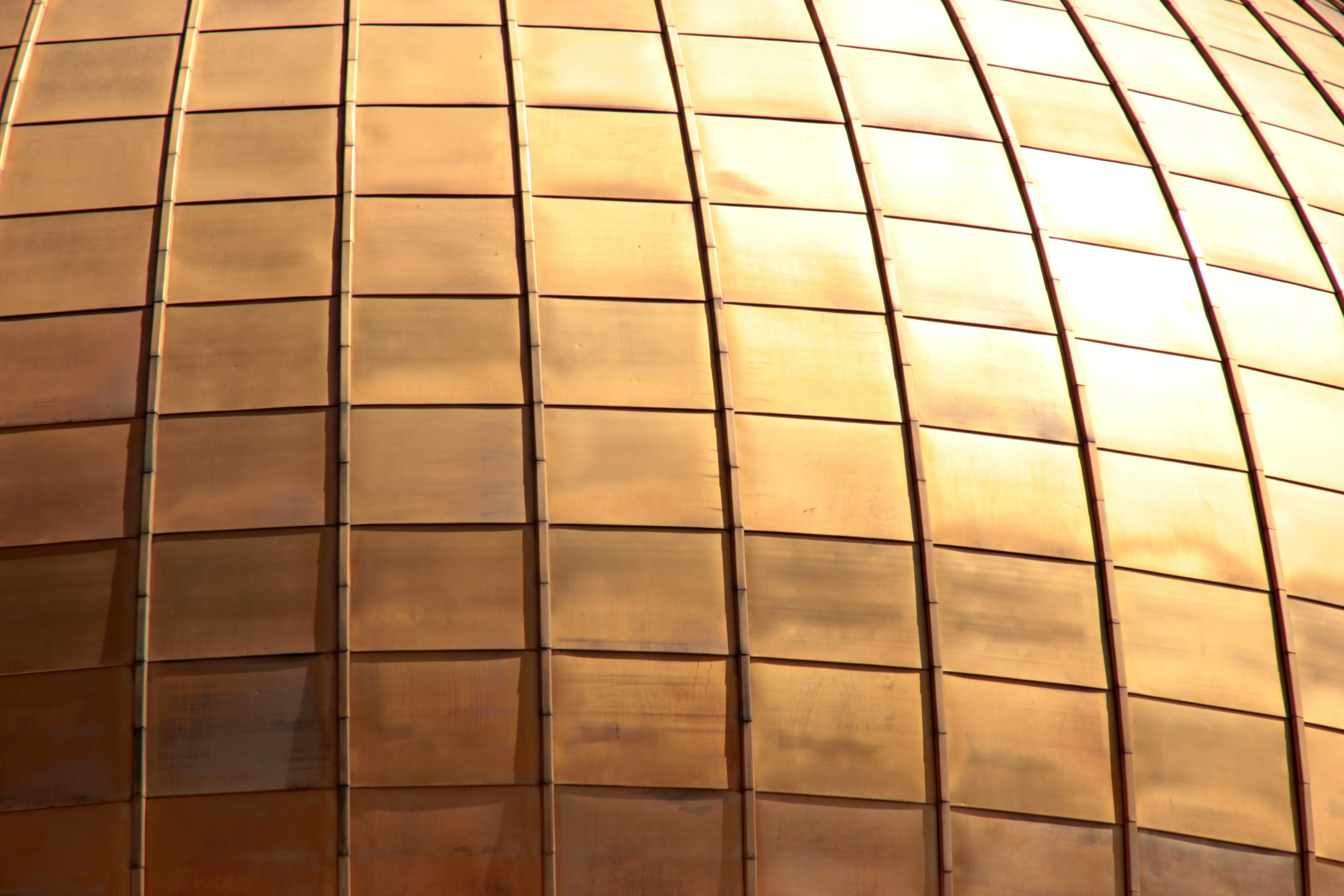 closeup photo of brass-colored wall