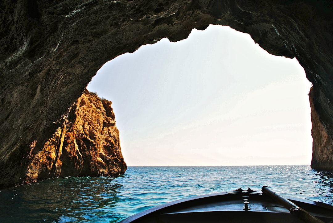 boat inside of water cave, Mouth of the cave