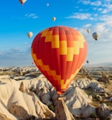 assorted-color hot air balloons floating