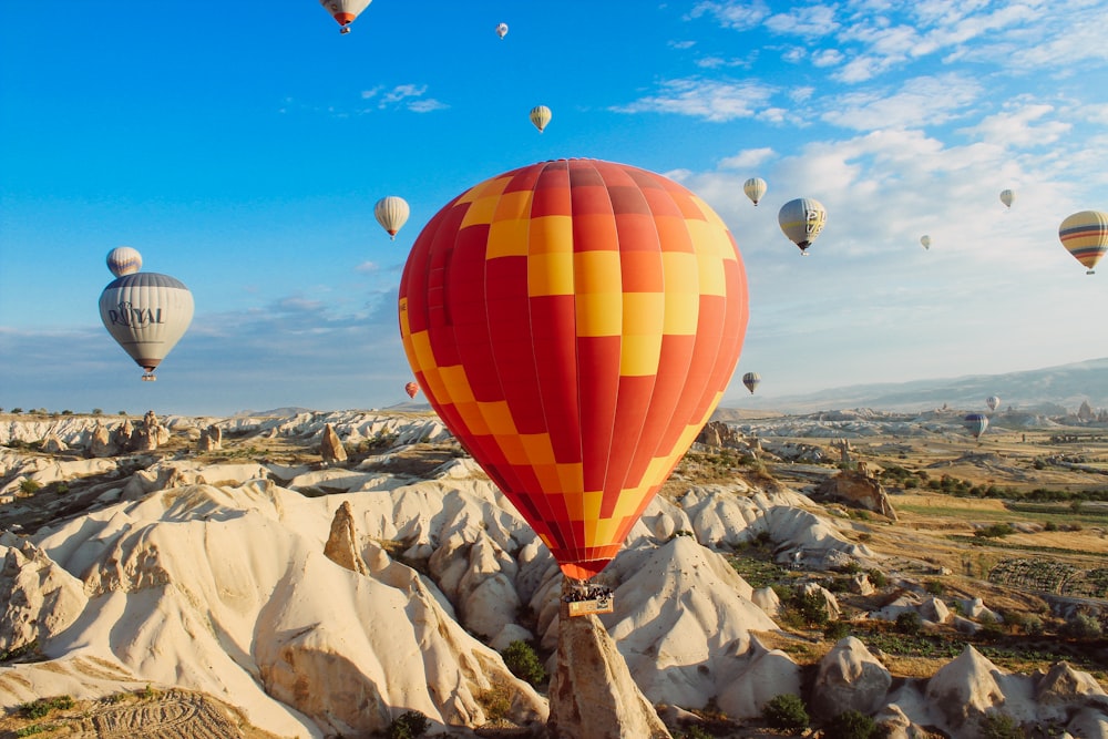 assorted-color hot air balloons floating