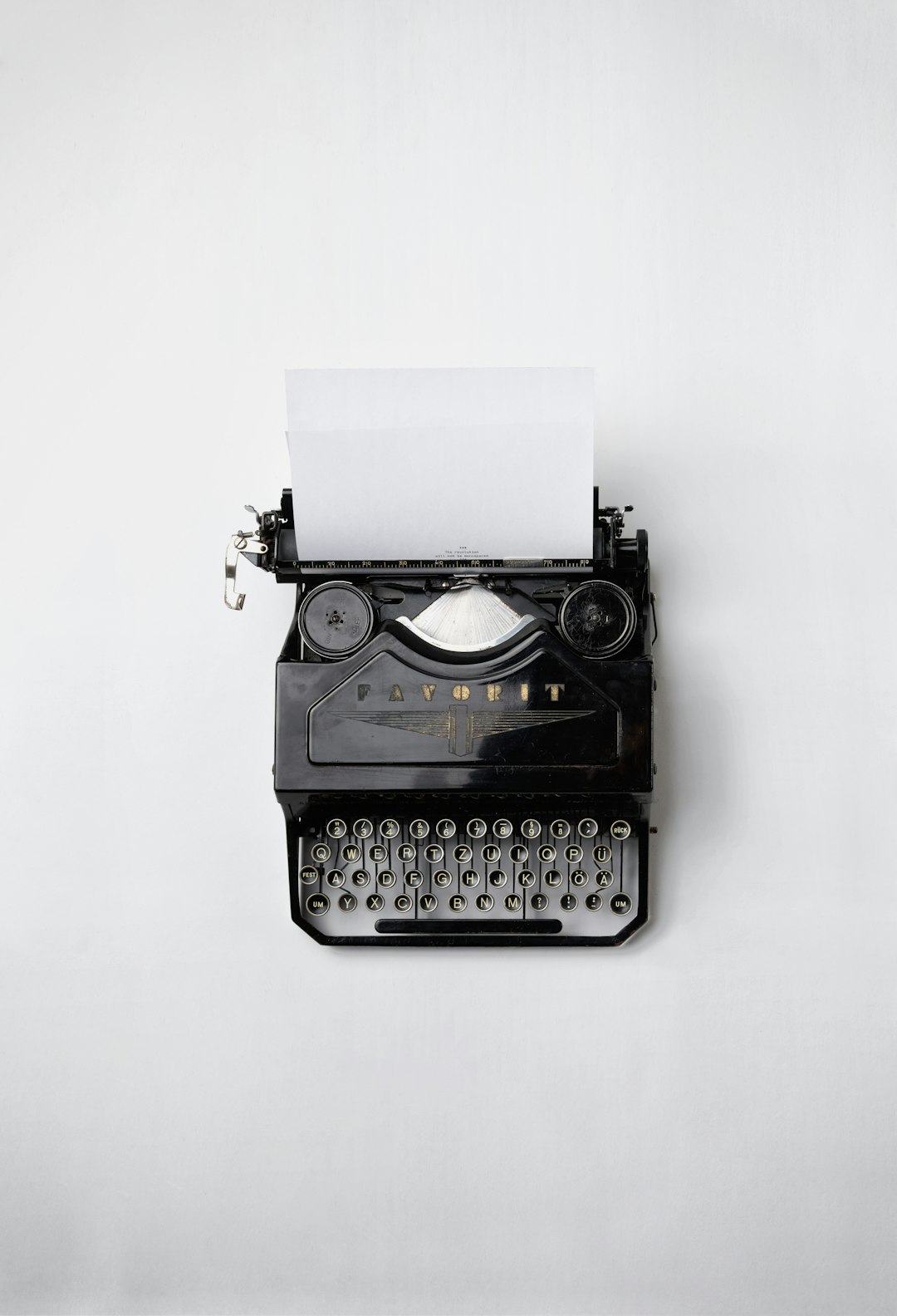 black Fayorit typewriter with printer paper black Fayorit typewriter with printer paper