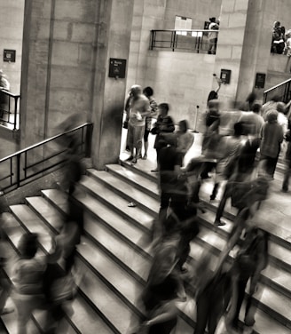 group of people walking on the stairs