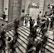 group of people walking on the stairs