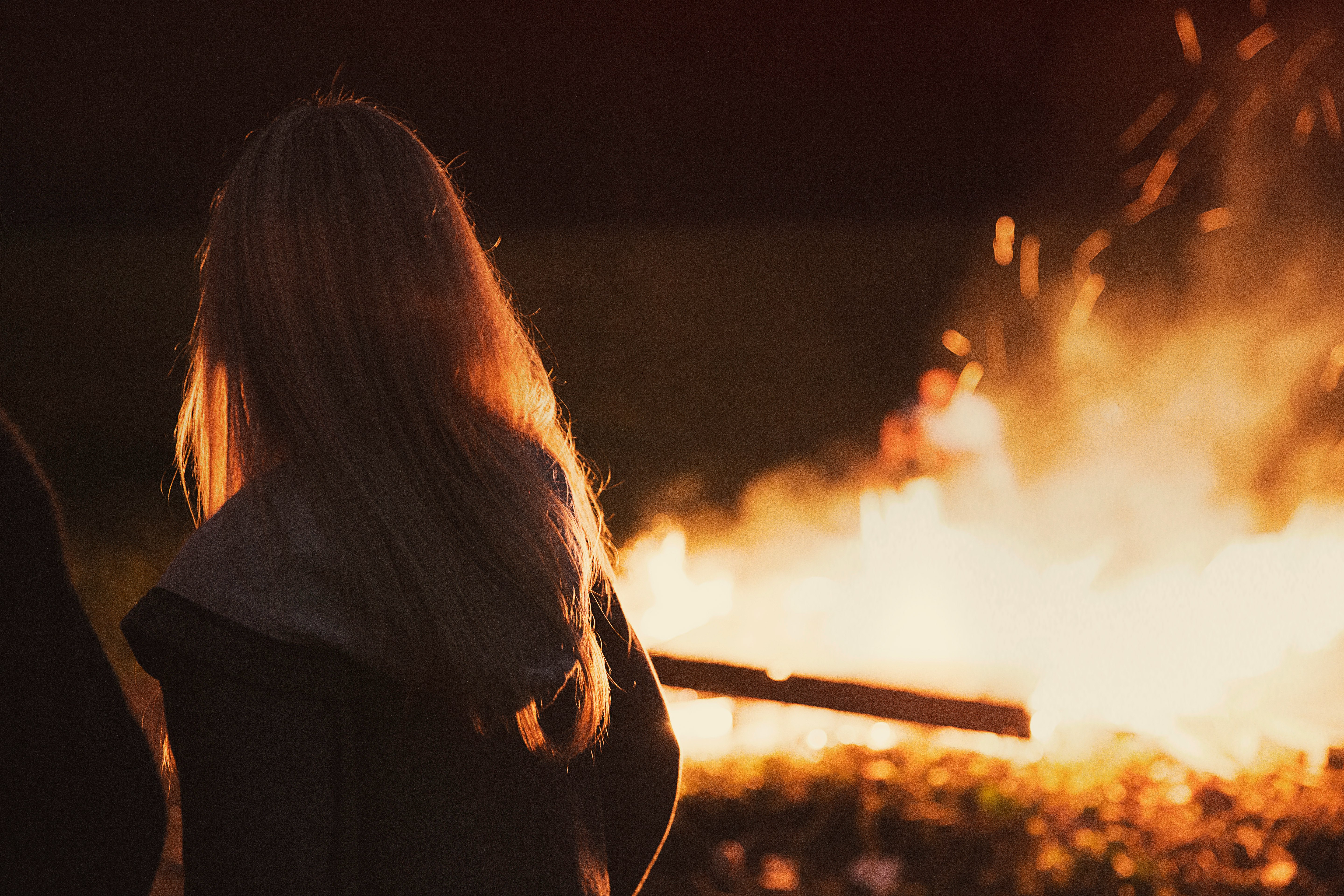 woman beside fire