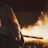 woman beside fire