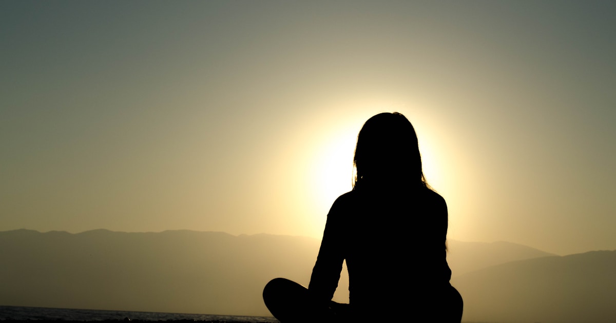 What are the best mindfulness practices? by Mindful Ideas woman sitting on sand
