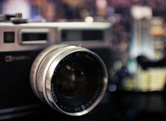 black and gray camera bokeh photography