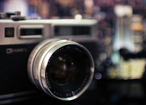 black and gray camera bokeh photography