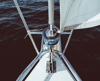 silver and white boat on body of water