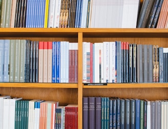 A bookshelf filled with law books and intellectual property references.
