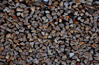 Stacked seasoned oak firewood ready for cozy fires in Midlothian homes.