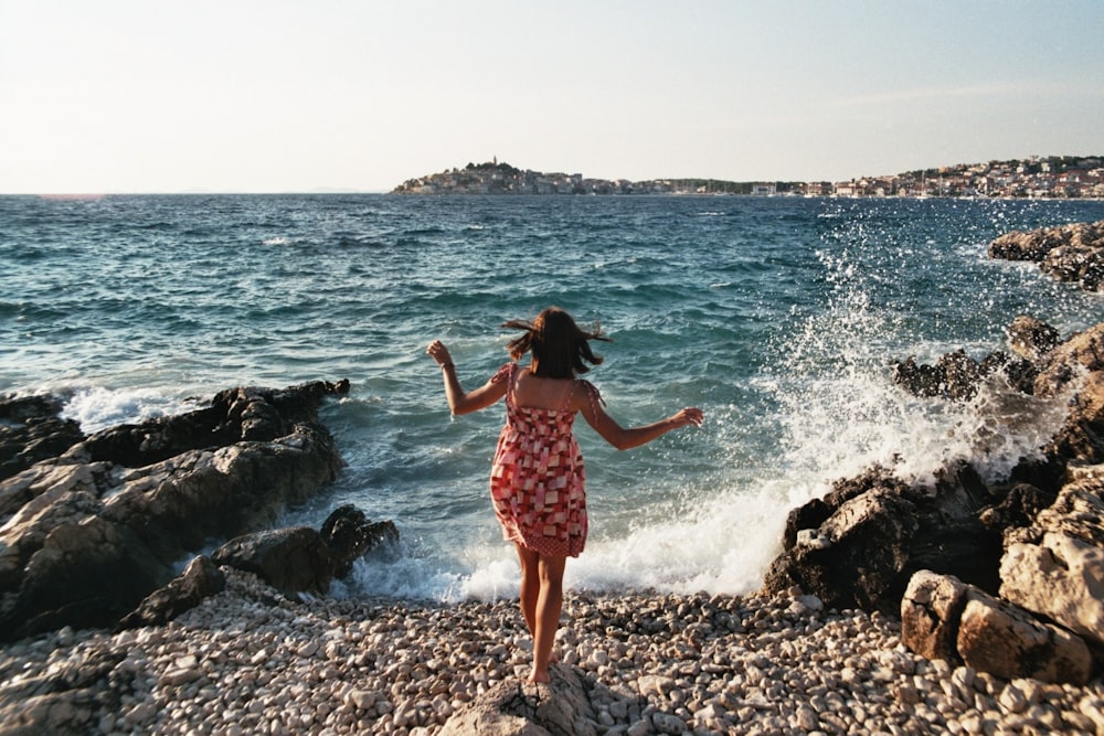 woman standing on seashore