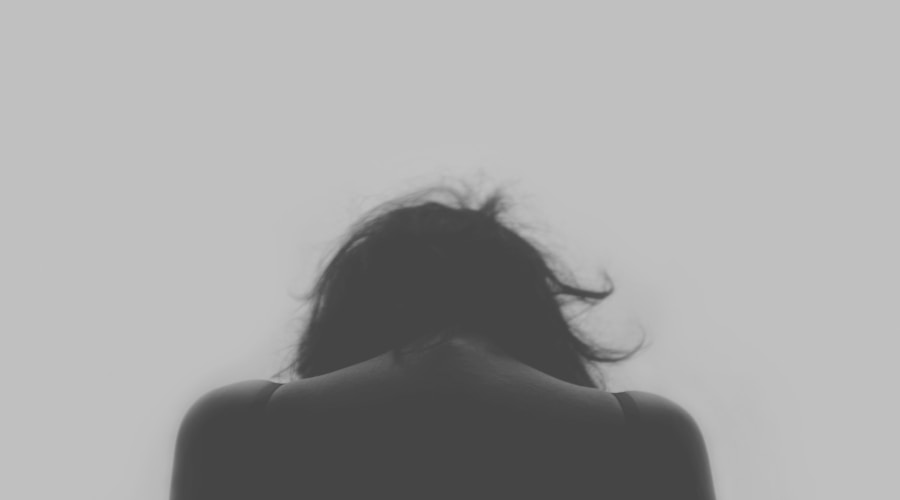 grayscale photo of person's back