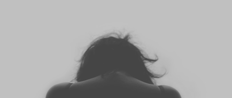 grayscale photo of person's back