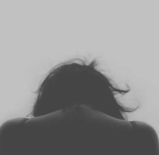 grayscale photo of person's back