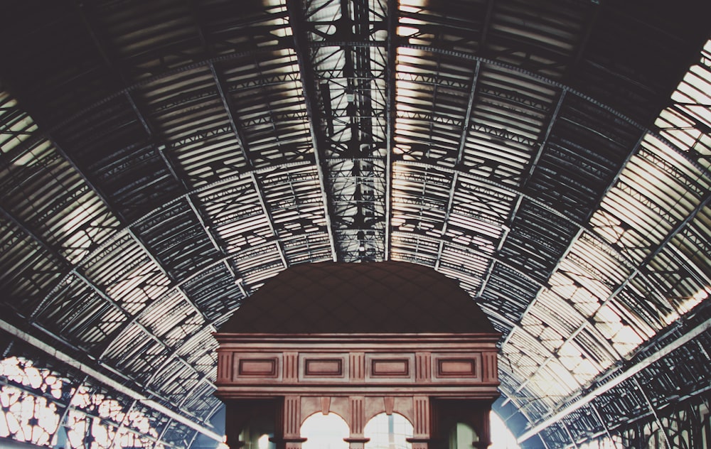 arch-shaped galvanized sheet roof during daytime