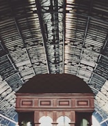 arch-shaped galvanized sheet roof during daytime