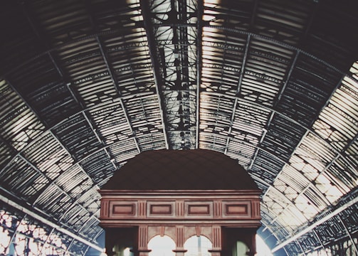 arch-shaped galvanized sheet roof during daytime