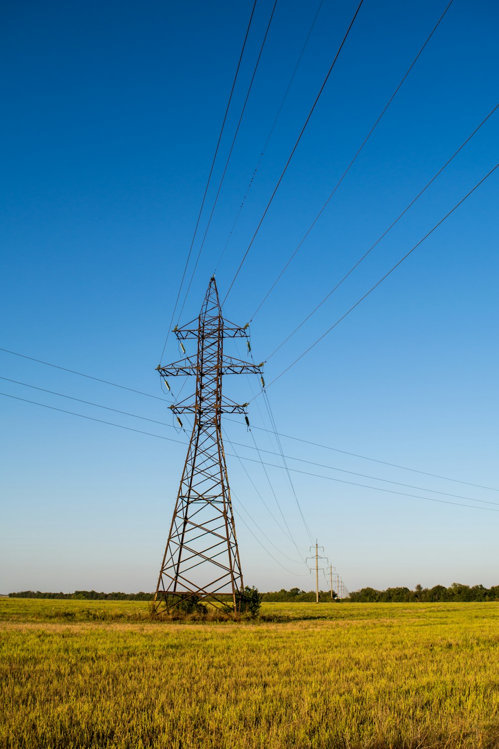 landscape photography of transmission tower