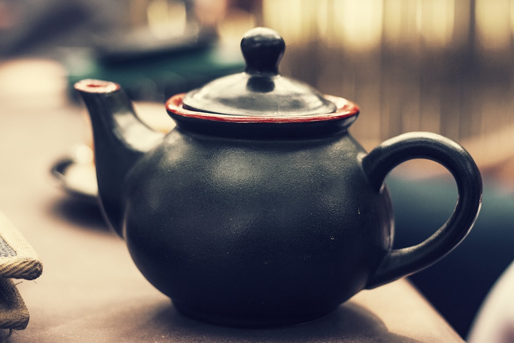 black and red ceramic kettle