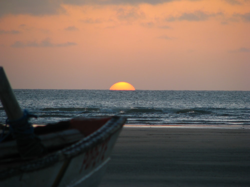 calm body of water at sunset